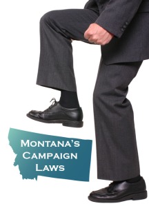 Picture of a man stepping on campaign laws